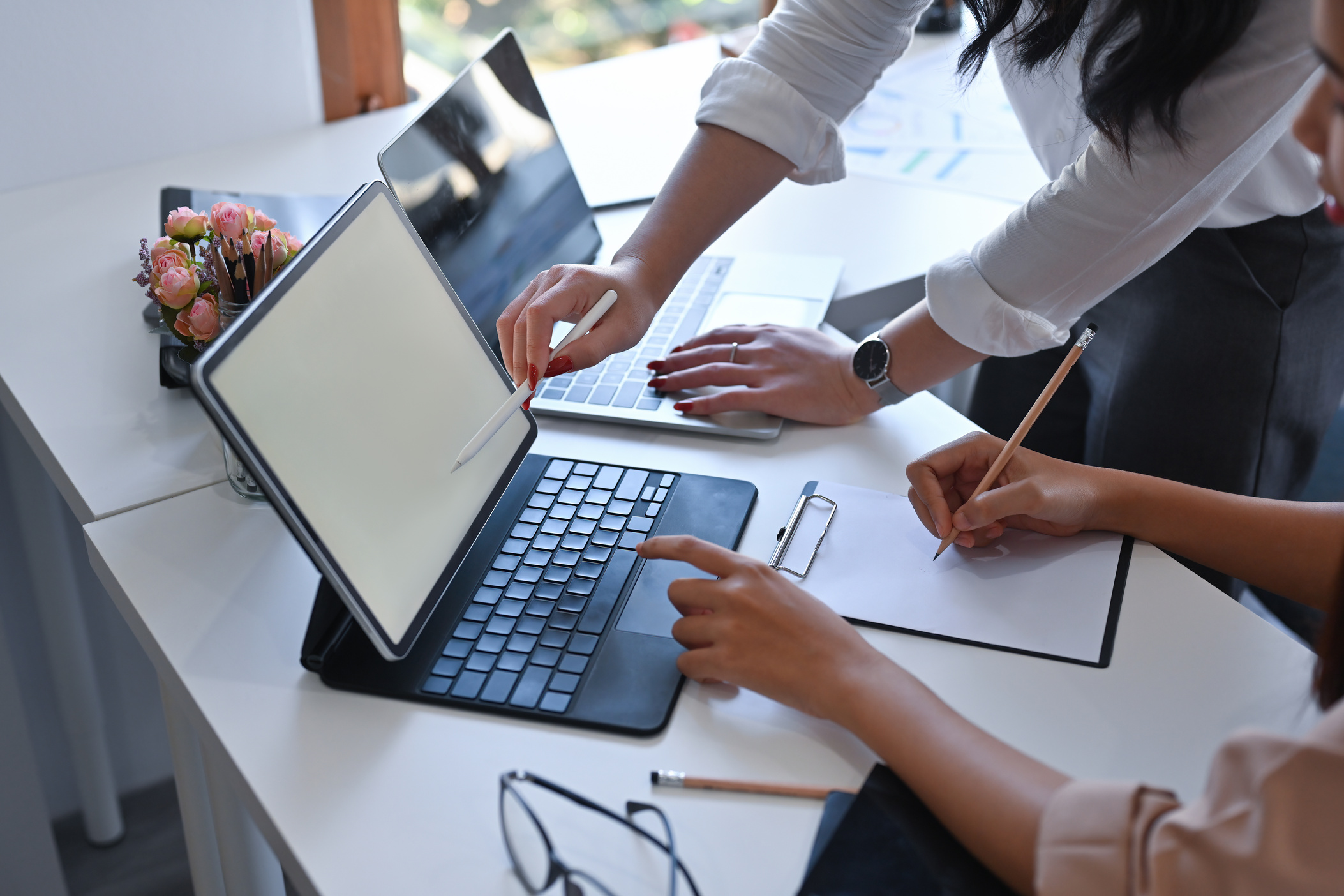 Cropped view with business people working together in the of